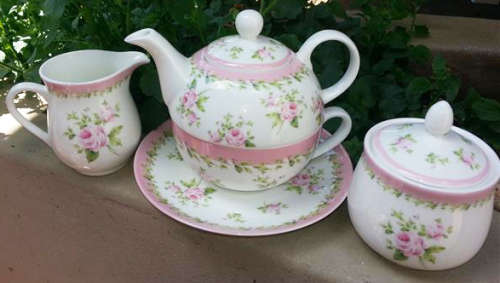 OH SO PRETTY.TEA FOR ONE TEAPOT CUP SAUCER COMBINATION WITH MATCHING MILK AND SUGAR